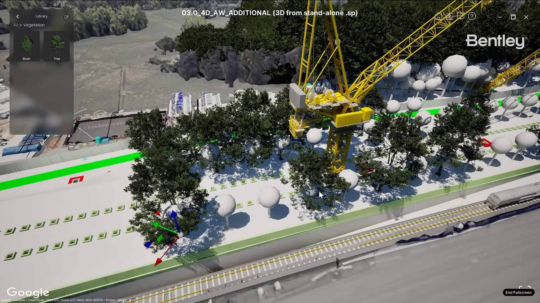 A digital rendering of a construction site features a large yellow crane, numerous trees, and spherical objects, situated alongside a multi-lane roadway.